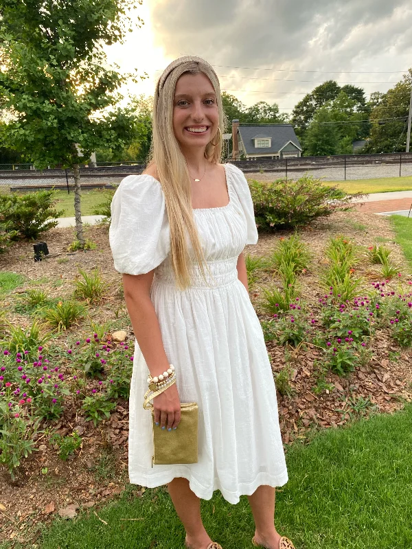 White Dress with Peplum Sleeves and Open Tie Back