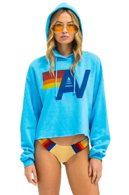 LOGO CROPPED PULLOVER RELAXED HOODIE - NEON BLUE Hoodie with Raw Hem Edgy Unfinished LOGO CROPPED PULLOVER RELAXED HOODIE - NEON BLUE Hoodie with Raw Hem Edgy Unfinished