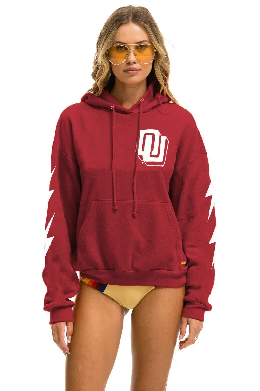 UNIVERSITY OF OKLAHOMA BOLT 4 PULLOVER HOODIE RELAXED - CRIMSON Hoodie with Patch Decorative Personalized UNIVERSITY OF OKLAHOMA BOLT 4 PULLOVER HOODIE RELAXED - CRIMSON Hoodie with Patch Decorative Personalized